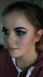 Grace is wearing slate coloured smokey eyes and nude lip