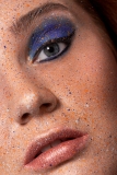 Blue and orange colour splash makeup