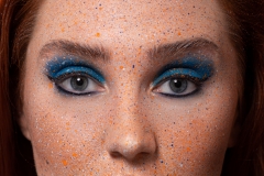 Blue and orange colour splash makeup