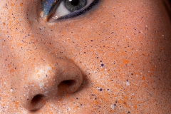 Blue and orange colour splash makeup