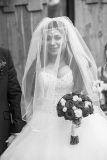 Photo of bride asian bride Kay after her wedding service at The Treehouse in Alnwick, Northumberland.