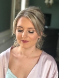 Gold eyeshadow and pretty pink lip for this stunning bridesmaid