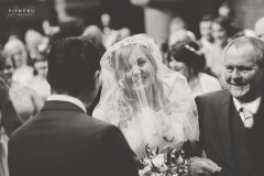 Beautiful image of Bride Steph with her dad and her groom at the church before her Wedding reception at Lordstones, North Yorkshire. Makeup by Gemma Rimmington.