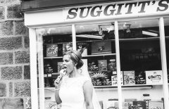 Bride Rachel enjoying an ice cream after the wedding at Wrays Barn in Great Ayton. Makeup by Gemma Rimmington.