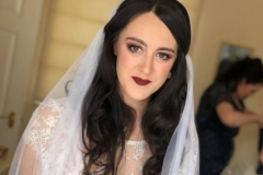 Vintage inspired gown and veil on bride Jo with dark vampy bridal makeup