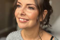 Radiant bridesmaid makeup in natural light