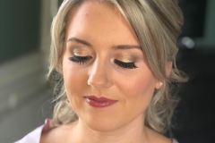 Gold eyeshadow and pretty pink lip for this stunning bridesmaid