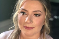 Glowy and glam makeup on beautiful bridesmaid at The Talbot Hotel, Malton