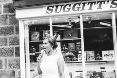 Bride Rachel enjoying an ice cream after the wedding at Wrays Barn in Great Ayton. Makeup by Gemma Rimmington.