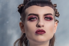 Grunge vampy makeup using dark plum on the eye makeup and dark plum on the lips.  Fashion photoshoot took place at Middlehaven, Teeside.