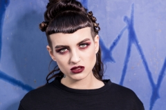 Grunge vampy makeup using dark plum on the eye makeup and dark plum on the lips.  Fashion photoshoot took place at Middlehaven, Teeside.