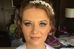 Jess's eyes are beautiful with copper tone eyeshadows, false lashes and a winged liner