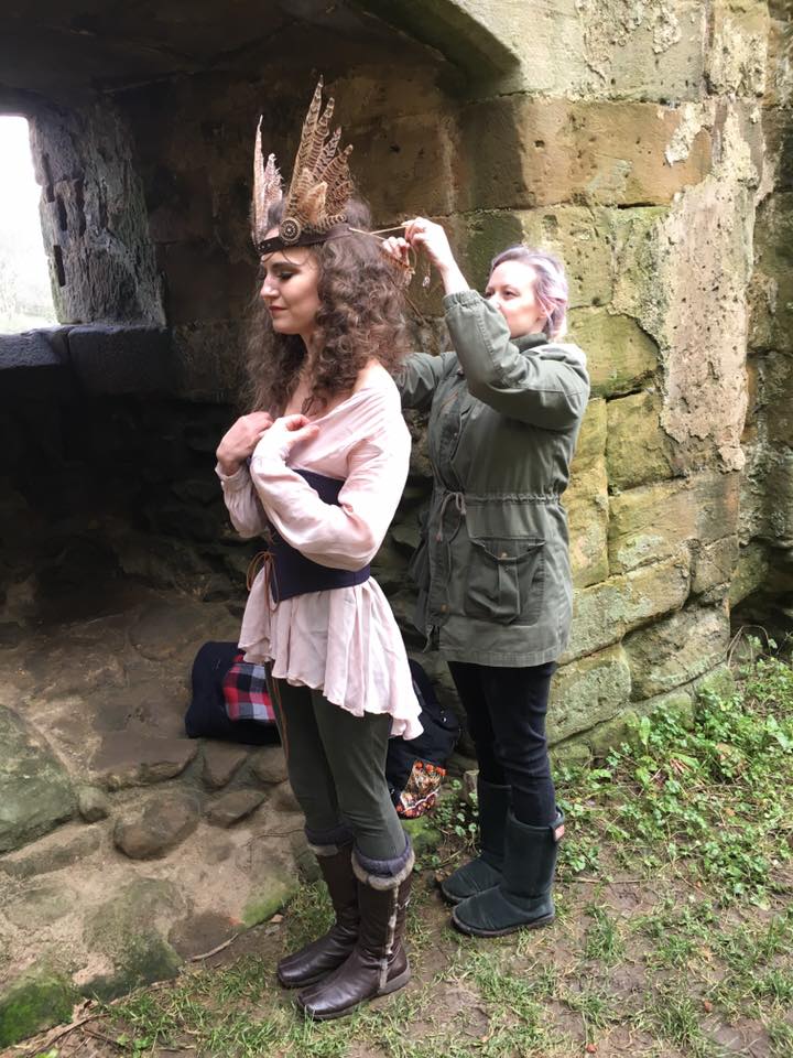 Rachel putting the finishing touches to the 'Valkyrie' headpiece on model Amy