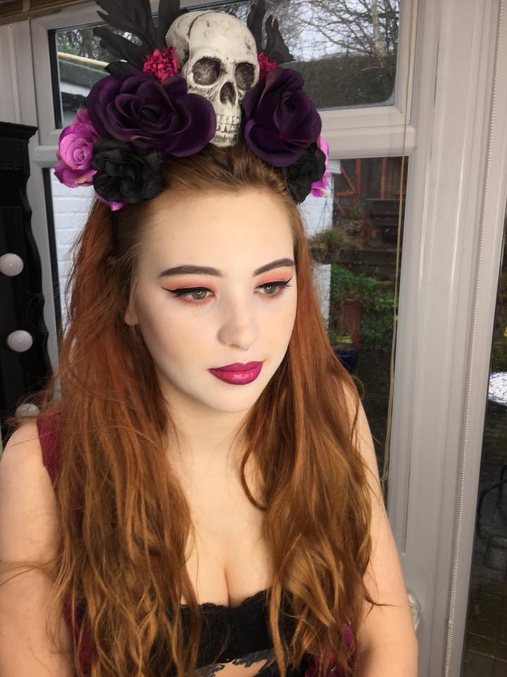 Lottie just finished getting her makeup done in the studio