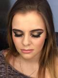 Grace wearing a heavy brown and gold eye winged eye look