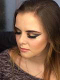Grace wearing a heavy brown and gold eye winged eye look