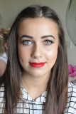 Ellie's natural beauty was enhanced with a catflick eyeliner and red lips