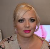Gemma wears blue smokey eyes and fuscia pink lips for her special occasion