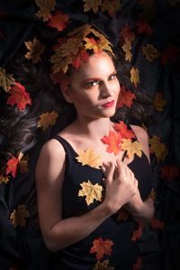 Image taken by Simon Hogben. Model Amy Coulson represents the season Autumn and looks stunning with makeup by Gemma Rimmington - in yellow, orange and red tones. 