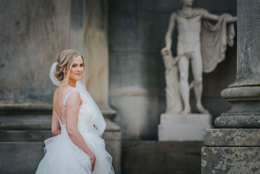 Glowing bride looks flawless and so happy