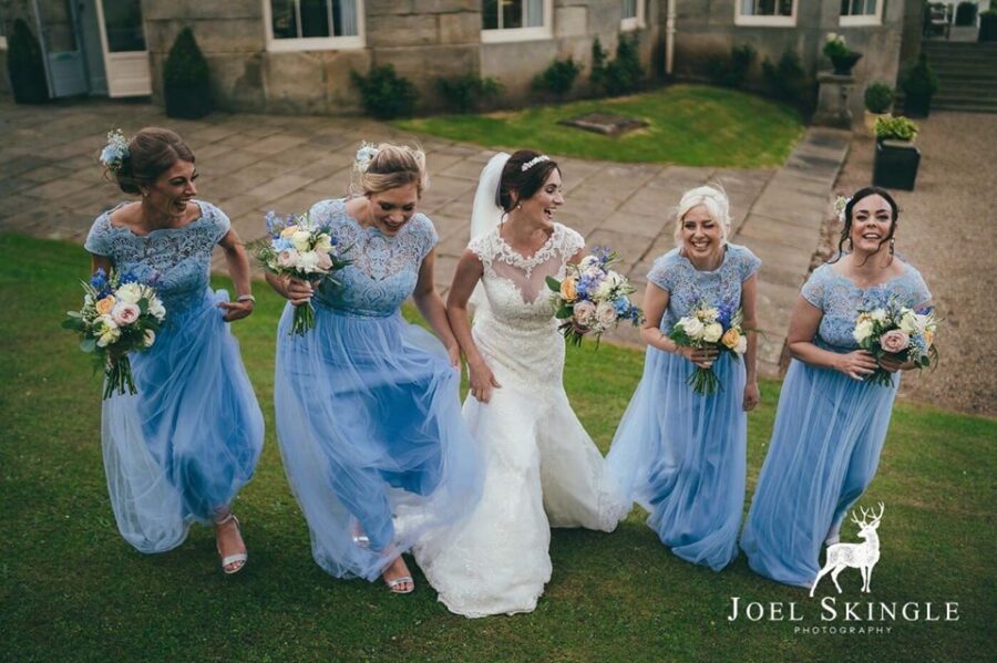 Stunning bridal party with glowing skin and big smiles at Wynyard, Yarm