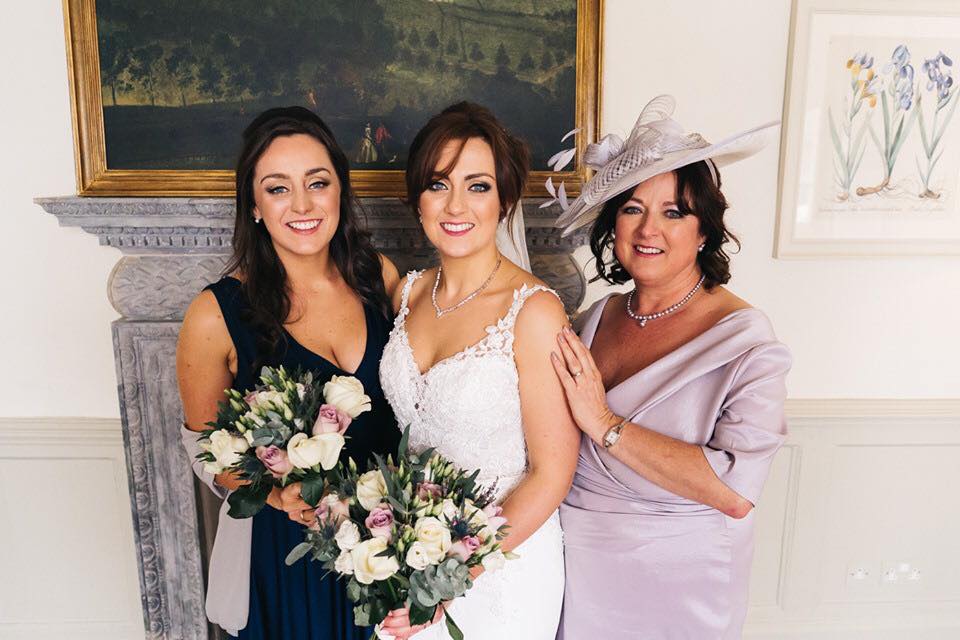 Glowing skin, gold and bronze eyes and pink lips for this bridal party